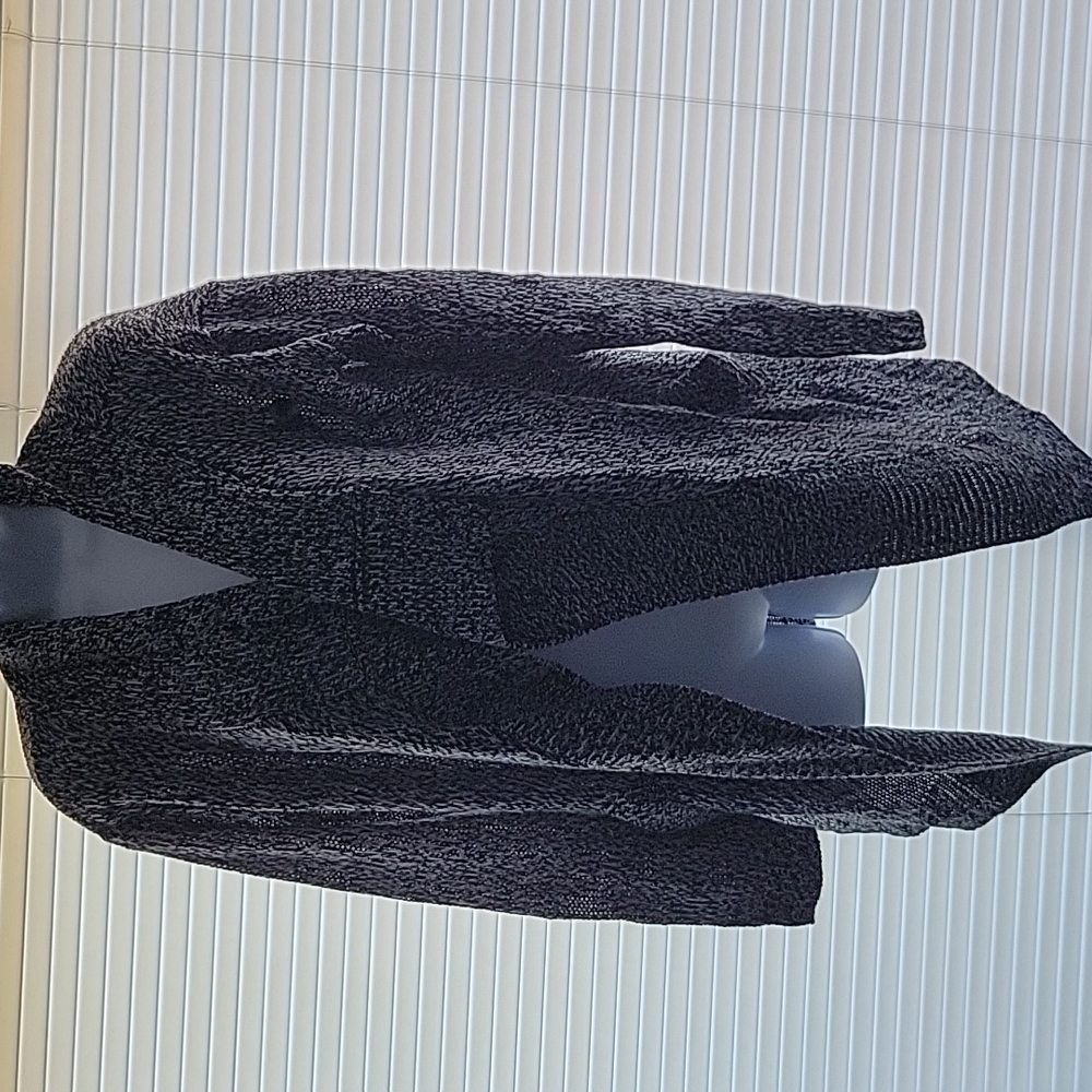 Black and white knitted sweater with pockets
